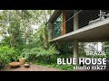 Casa azul raised concrete home in a  brazilian forestbim concept present