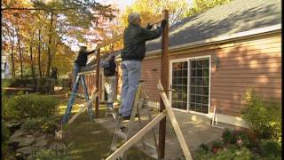 Build a pergola or arbor over your patio to serve as a semi-open roof. Visit Ron Hazelton