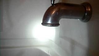 Bathtub spigot dripping.AVI