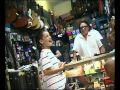 White kid sing the blues in guitar shop like its nobodys business