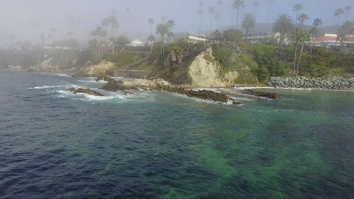 through the clouds .. on the beach.. in laguna beach