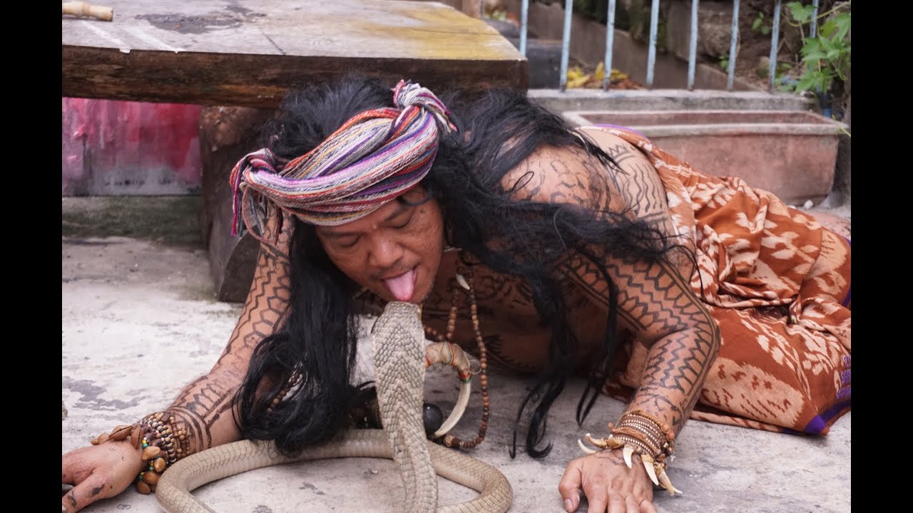 Body Painting and Men Kissing the Cobra