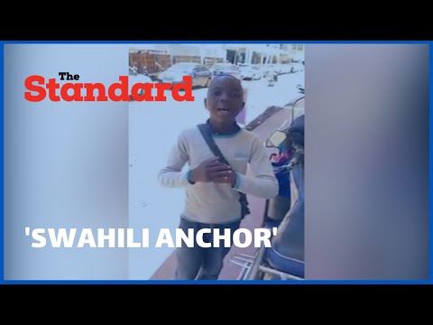Young boy presents news by imitating a Swahili news anchor