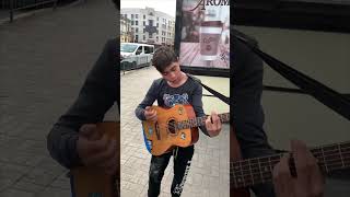Talented Youngman Displays His Guitar and Vocal Skills