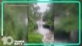 Car drifts through flooding in Rhode Island