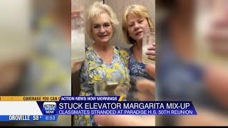 Cheers! Friends on stalled elevator hold margarita happy hour on Facebook