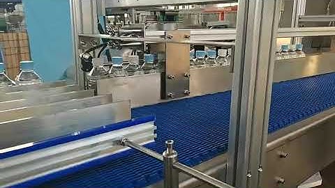 Automatic drop down wrap around case packer  #casepacker  #bottlepackingmachine