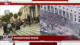 Protesters chant in front of Miami-Dade County Courthouse