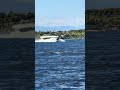 Motor Yacht SHIP HAPPENS plowing through the waves near Porto Heli, Greece