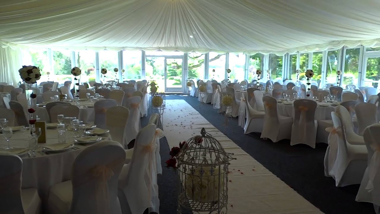 The Marquee at Nailcote Hall set up with a Mandap around the staging area