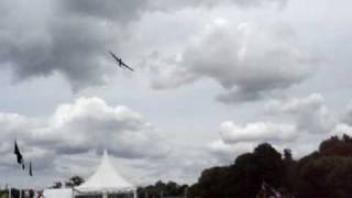 Lancaster Bomber flying over the river at Henley