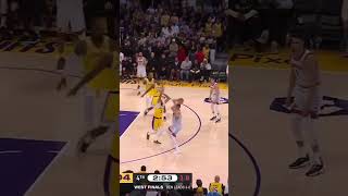 Jokic hits a wild 3 as the shot clock expires in the final minutes of a tight game!