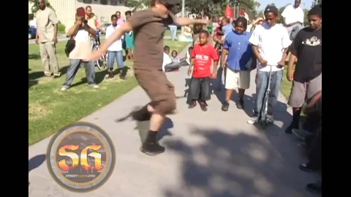 Stacy Peralta teaching skateboard tricks in the Ju...