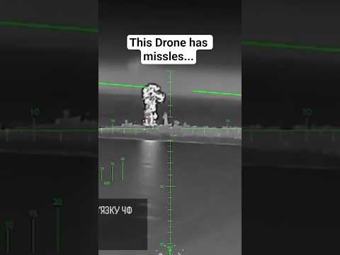 Drone equipped with unguided missles strafes a port.