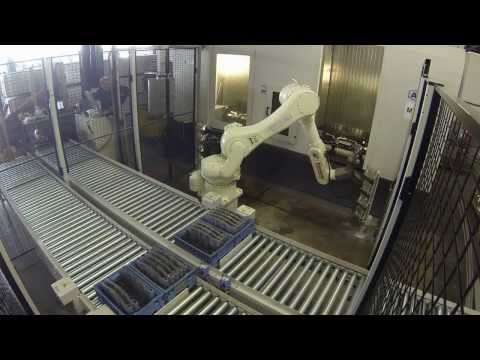 Kawasaki RS80N tending AXA DBZ milling machine