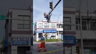 ‘How is that even possible?’: Crash leaves motorbike dangling