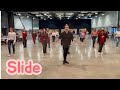 Slide Line Dance de Daniel Trepat (NL) et Mike Liadouze (FR)