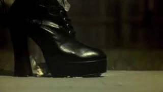 Easter Egg being crushed by a foot in slow motion.