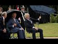 Boris johnson struggles with umbrella at police memorial unveiling