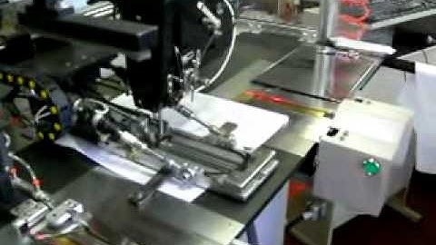 MA 04 Automated device for button holing