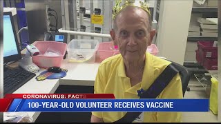 100-year-old volunteer receives COVID-19 vaccine