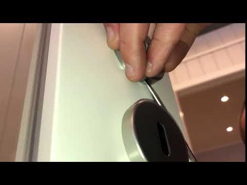 Video: Hur fungerar ett låsande dörrhandtag?
