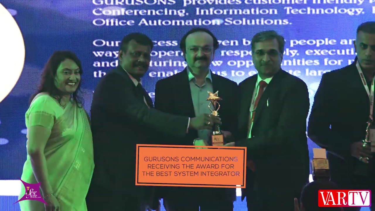 Gurusons Communications receiving the award for the Best System Integrator at VAR Symposium