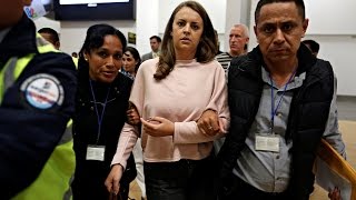 drug mule Melissa Reid beams with delight at the airport