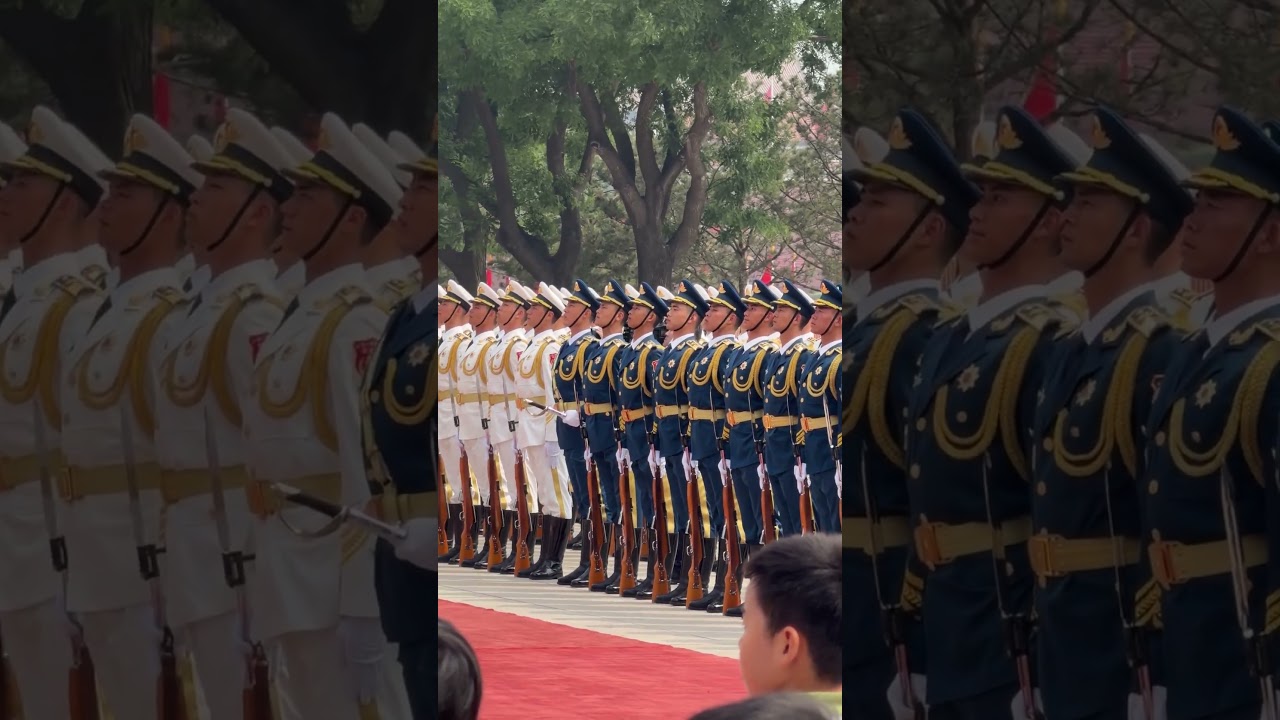 Chinese soldiers standing at attention for President Donald Trump