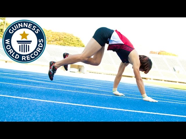 Fastest 100 m running on all fours - Guinness World Records class=