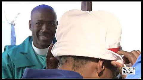 U DR THULANI MANANA ESENKONZWENI NOYISE OMZALAYO. (Dr Thulani Manana with his biological father).