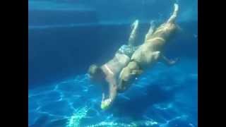 Captain Swimming the length of the pool