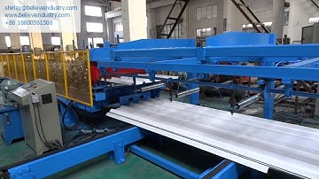 Roofing sheets roll forming machine with auto stacker.