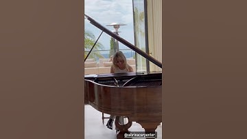 Thumbnail of Sabrina Carpenter playing the piano in Cannes, France.
