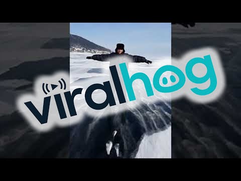 Strong Winds Slides Man Across Frozen Lake || ViralHog