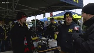 Football fans tailgating in Ann Arbor before OSU-UM big game