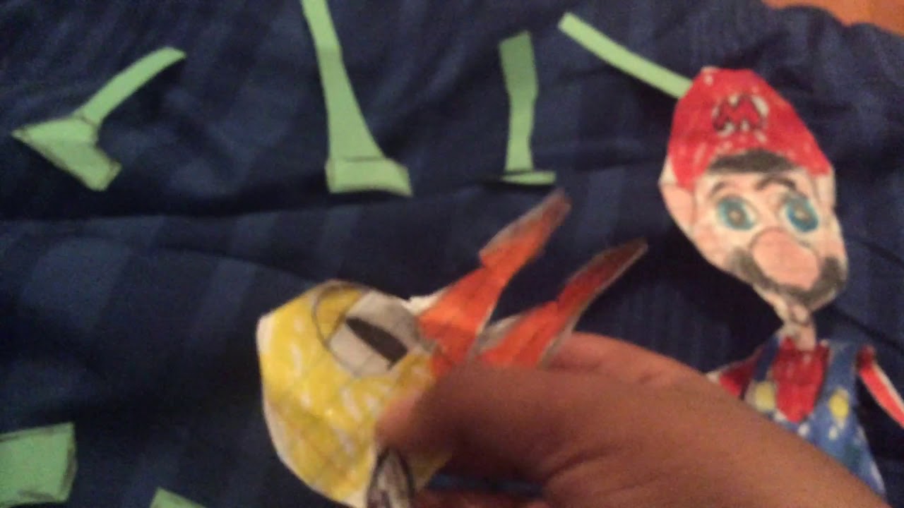 Flappy bird meets mario in cut out papper. Two dimensional paper animation video
