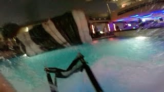 Watch: BASE jumper lands in rooftop pool