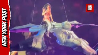 Katy Perry nearly DROPS into the crowd when stage prop malfunctions midair
