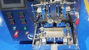 Automatic hardware packaging machine with manual feeding
