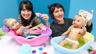 Bebek videoları. Baby Born oyuncak bebekler ile banyo zamanı. Bebek bakma oyunu Resimi