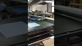 Automatic unloading arm for screen printing
