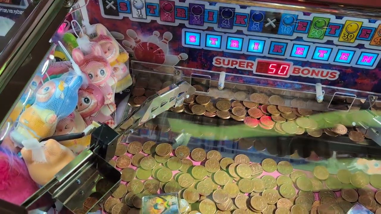 Strike Ten 2p coin pusher at the Burnham Pier Amusements
