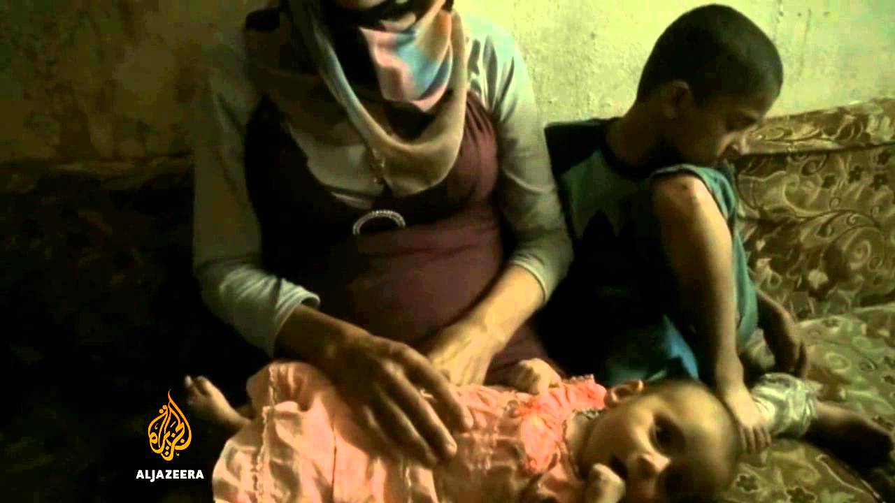 يحاول الأيتام النجاة من الحرب في سوريا