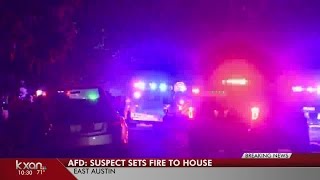 Barricaded suspect sets east Austin house on fire, aims gun at firefighters