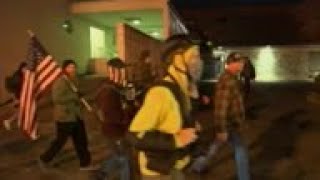 Man takes rifle to racial injustice protest in US
