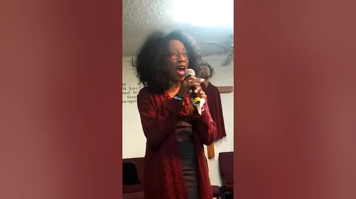 Evangelist Deborah Madden singing  Love lifted me