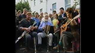 Joe Burke (Button Accordion) with Anne Conroy Burke (Guitar) and Michael Cooney (Uilleann Pipes) chords