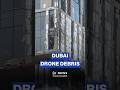Dubai finance hub building hit by intercepted drone debris
