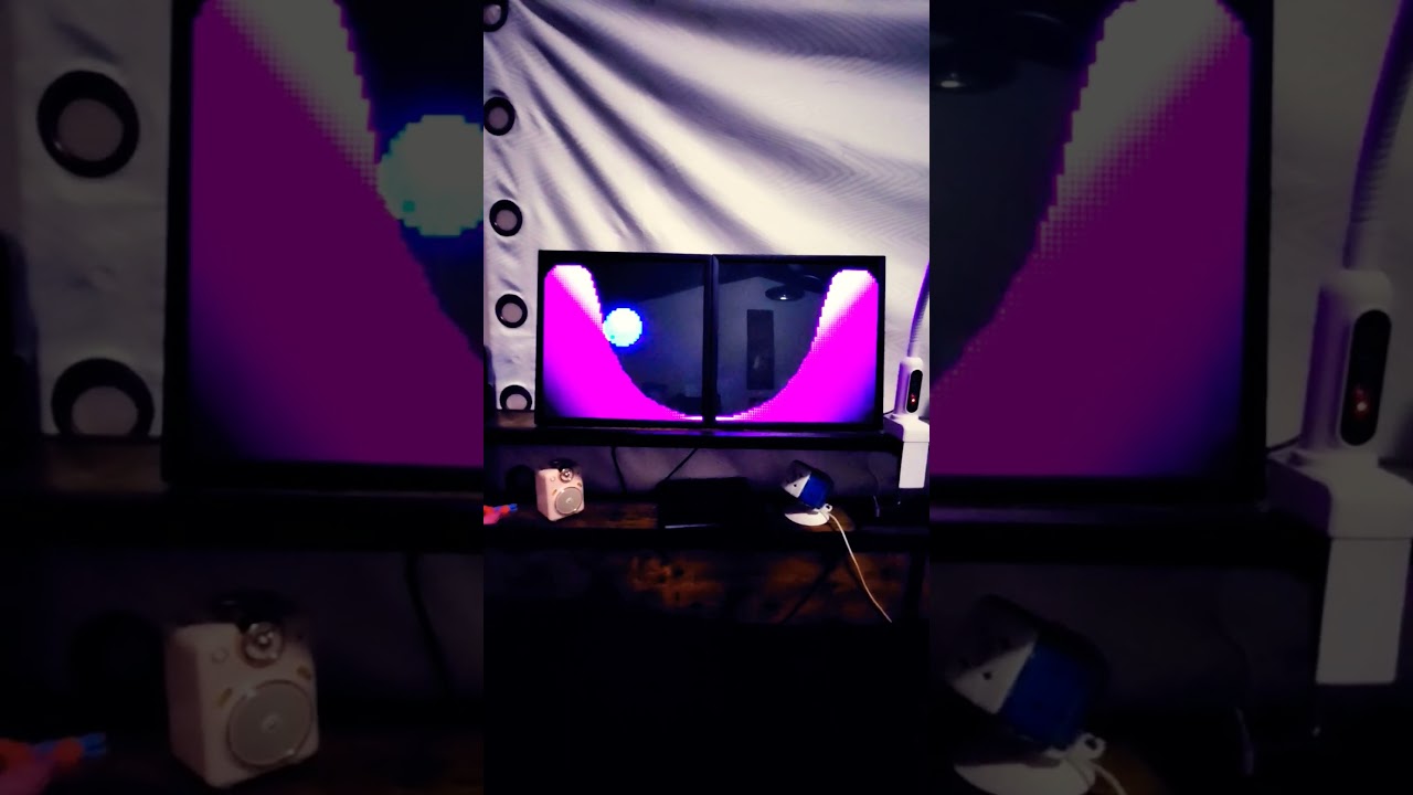 Pixel art animation. Cool effects using two of  divooms Pixoo 64's side by side. 